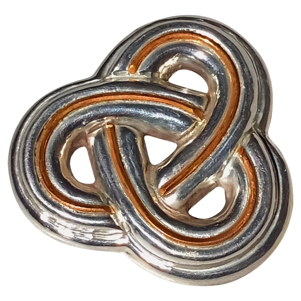 Broche de triqueta de cobre