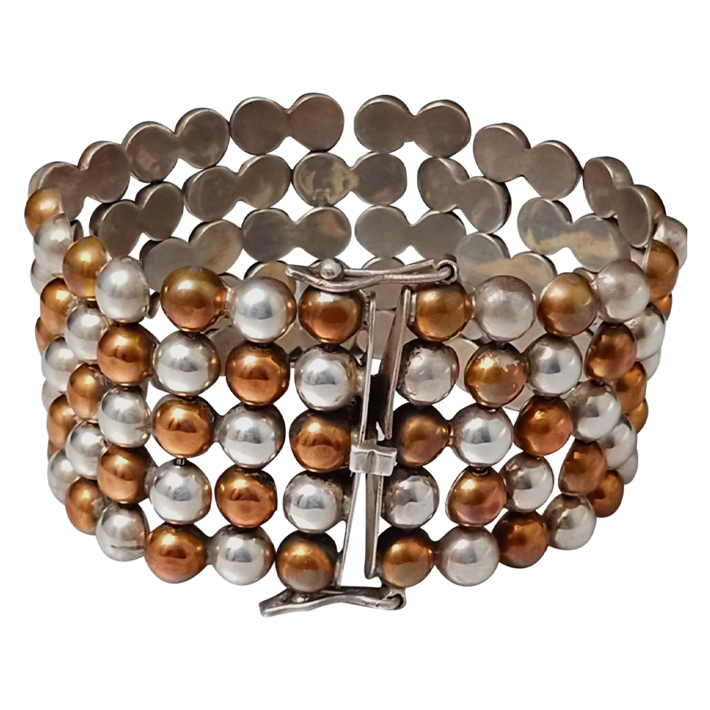 Pulsera de media perla de cobre